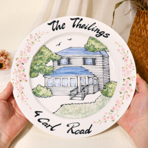 Custom round house portrait plate with pink floral border, family name, and address