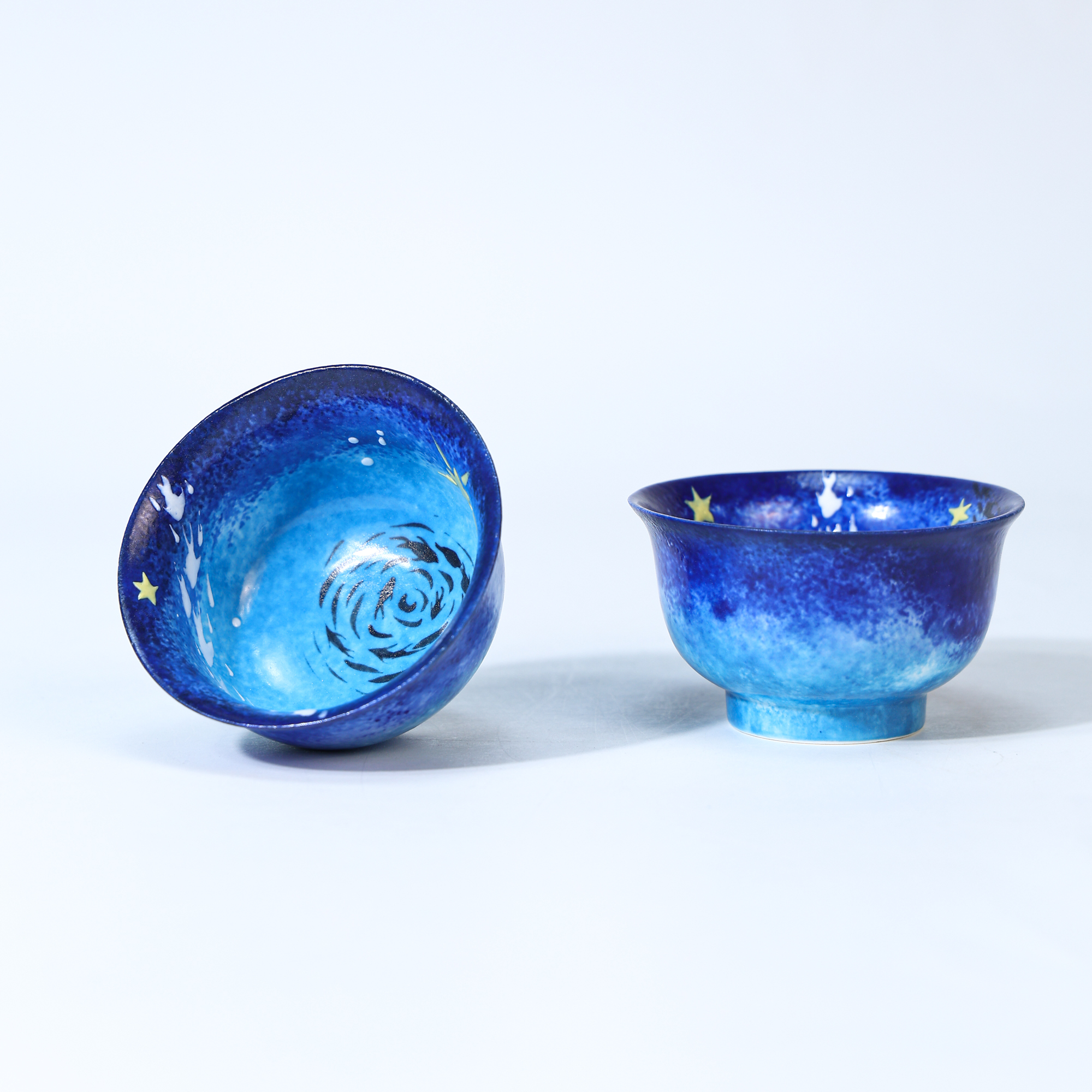 Hand-painted blue galaxy starry night ceramic cup with gold star details