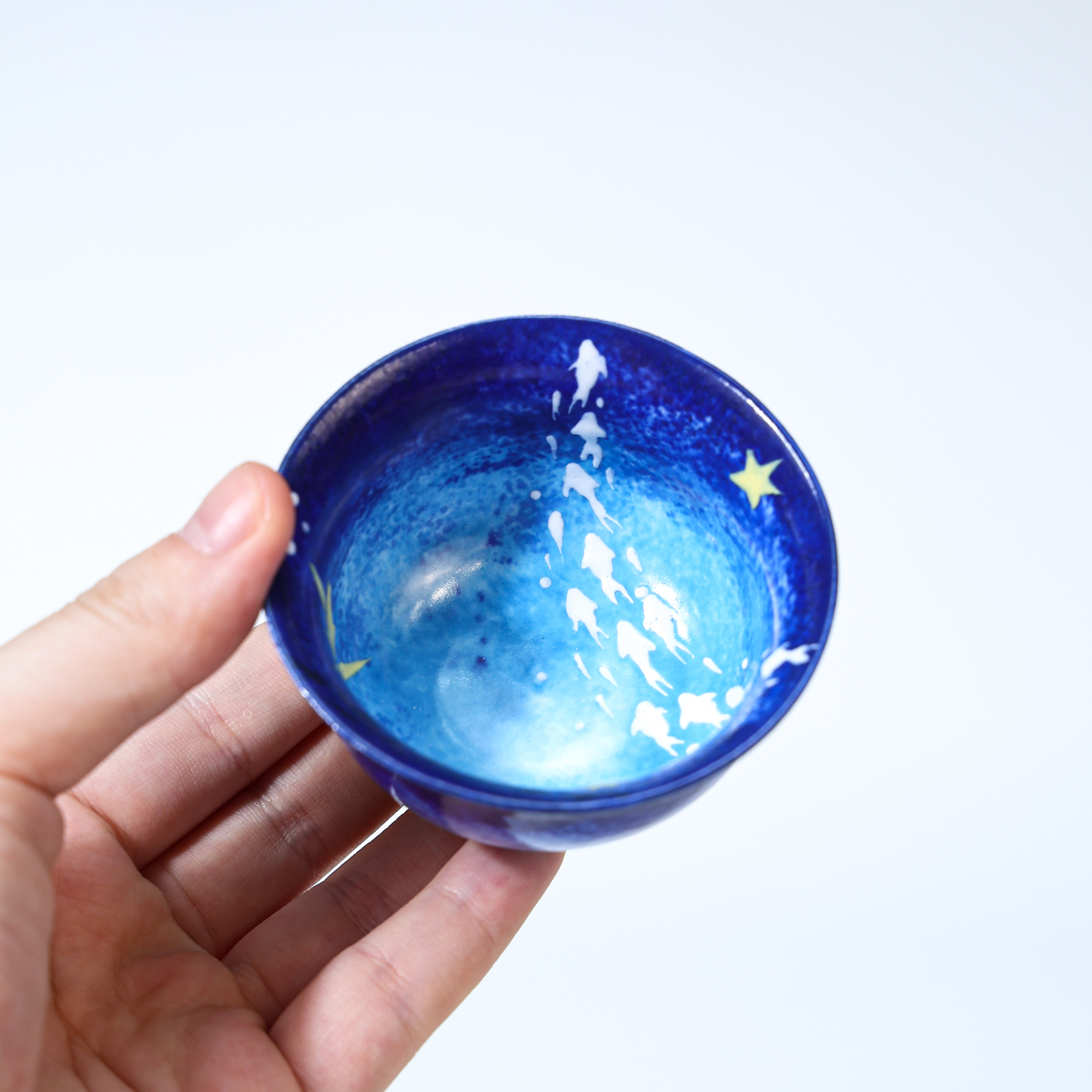 Hand-painted blue galaxy starry night ceramic cup with gold star details