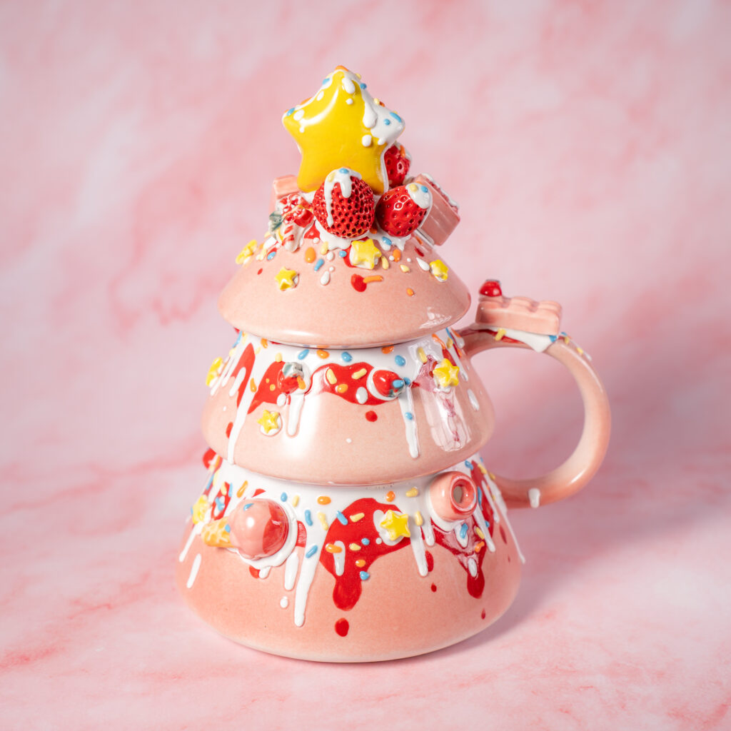 A playful hand-decorated porcelain teapot with layered details