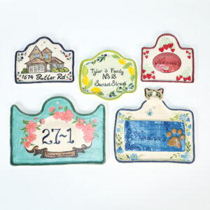 Five personalized hand-painted ceramic plaque and serving plate designs by Lychee Legacy